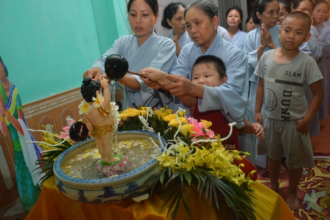 The ceremony of bath the Buddha in the Lumbini gardens of Buddhist  houses in Thai Binh province