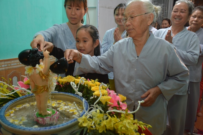 The ceremony of bath the Buddha in the Lumbini gardens of Buddhist  houses in Thai Binh province