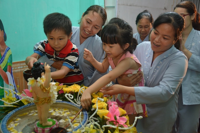 The ceremony of bath the Buddha in the Lumbini gardens of Buddhist  houses in Thai Binh province