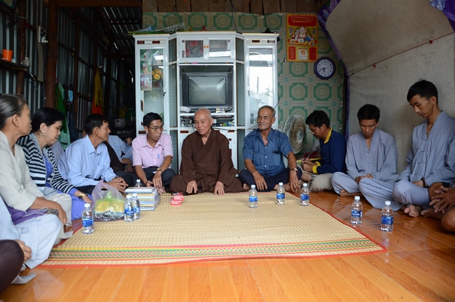 Money giving for supporting house building and animals release in Kien Giang