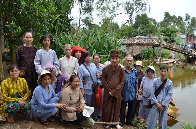 Money giving for supporting house building and animals release in Kien Giang