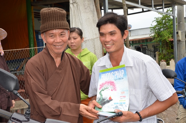 Money giving for supporting house building and animals release in Kien Giang