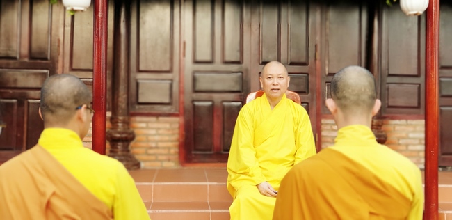 The security guard of the Hoang Phap Pagoda wishing Tet Senior Venerable Thich Chan Tinh on the lunar seventh Day