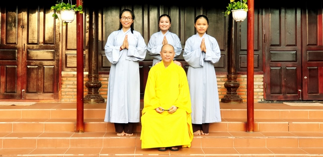 The security guard of the Hoang Phap Pagoda wishing Tet Senior Venerable Thich Chan Tinh on the lunar seventh Day