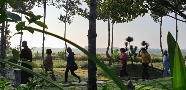 Monks and Buddhists wishing Tet Senior Venerable Thich Chan Tinh on the Tet's 4th day