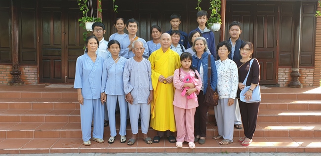 Monks and Buddhists wishing Tet Senior Venerable Thich Chan Tinh on the Tet's 4th day