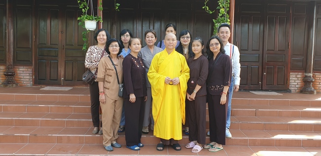 Monks and Buddhists wishing Tet Senior Venerable Thich Chan Tinh on the Tet's 4th day
