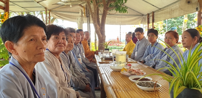 Monks and Buddhists wishing Tet Senior Venerable Thich Chan Tinh on the Tet's 4th day