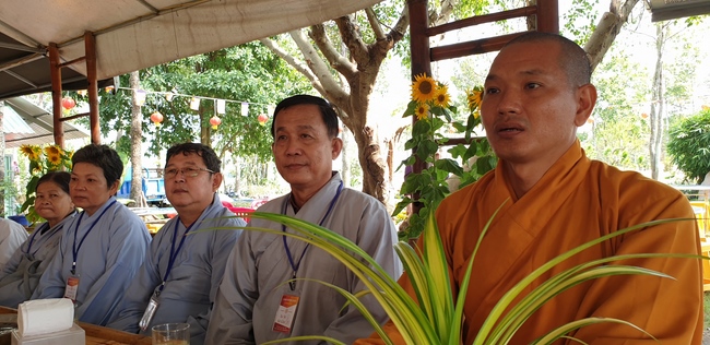 Monks and Buddhists wishing Tet Senior Venerable Thich Chan Tinh on the Tet's 4th day