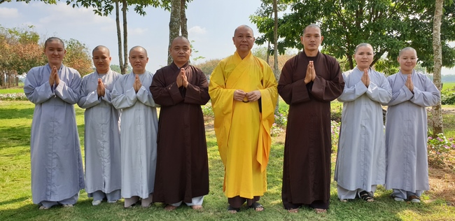 Monks and Buddhists wishing Tet Senior Venerable Thich Chan Tinh on the Tet's 4th day