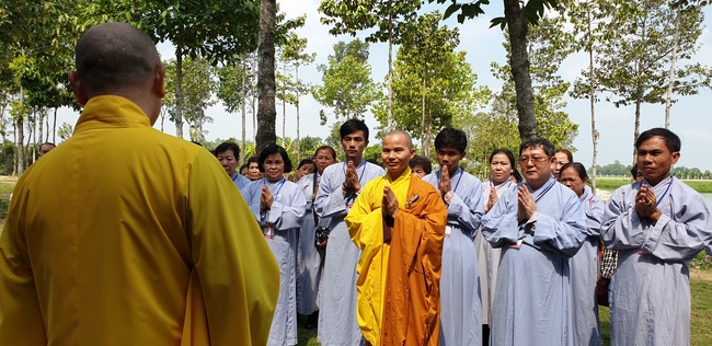 Monks and Buddhists wishing Tet Senior Venerable Thich Chan Tinh on the Tet's 4th day