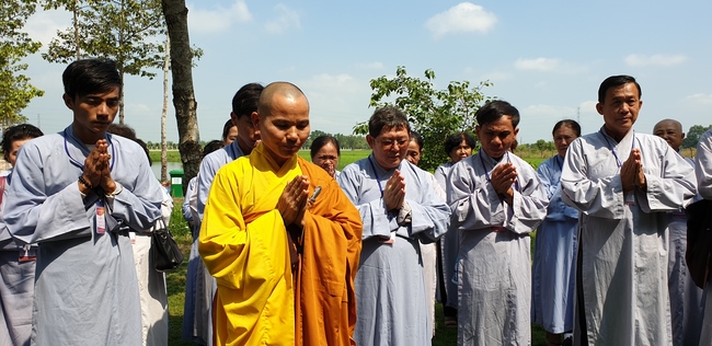 Monks and Buddhists wishing Tet Senior Venerable Thich Chan Tinh on the Tet's 4th day