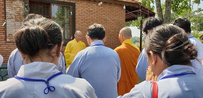 Monks and Buddhists wishing Tet Senior Venerable Thich Chan Tinh on the Tet's 4th day