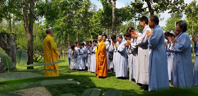 Monks and Buddhists wishing Tet Senior Venerable Thich Chan Tinh on the Tet's 4th day