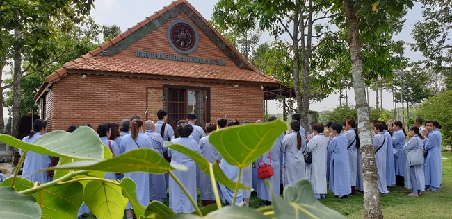Monks and Buddhists wishing Tet Senior Venerable Thich Chan Tinh on the Tet's 4th day