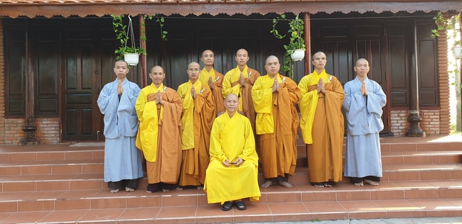 Monks and Buddhists wishing Tet Senior Venerable Thich Chan Tinh on the Tet's 4th day