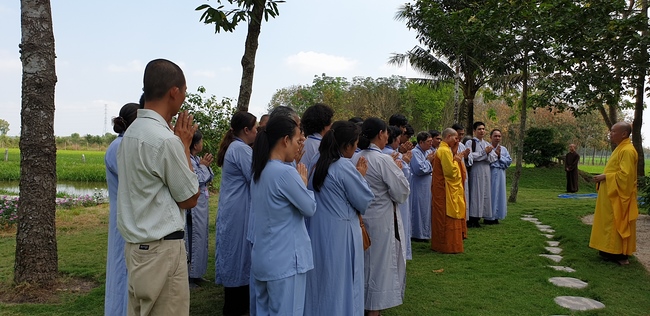 Monks and Buddhists wishing Tet Senior Venerable Thich Chan Tinh on the Tet's 4th day