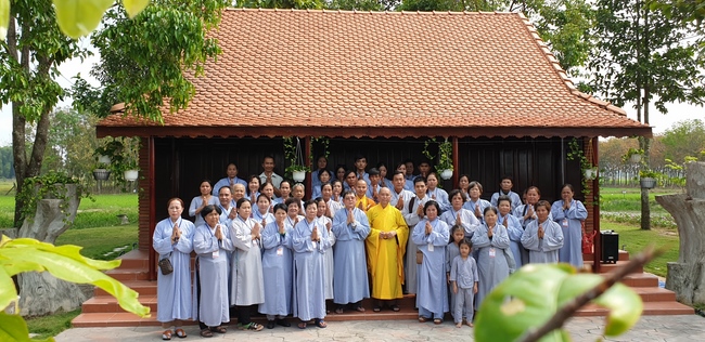 Monks and Buddhists wishing Tet Senior Venerable Thich Chan Tinh on the Tet's 4th day