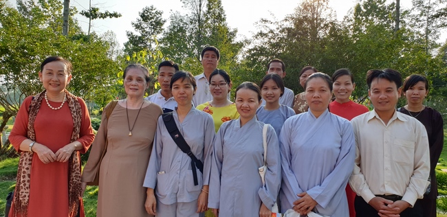 Monks and Buddhists wishing Tet Senior Venerable Thich Chan Tinh on the Tet's 4th day