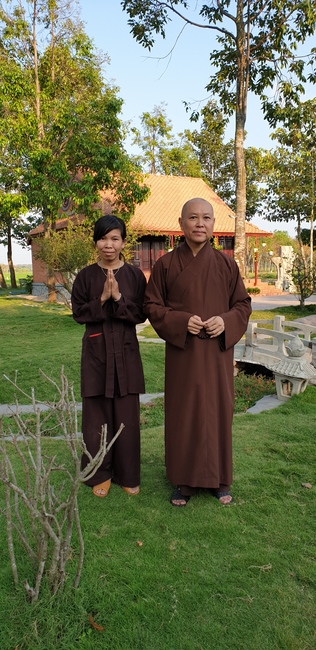 Monks and Buddhists wishing Tet Senior Venerable Thich Chan Tinh on the Tet's 4th day