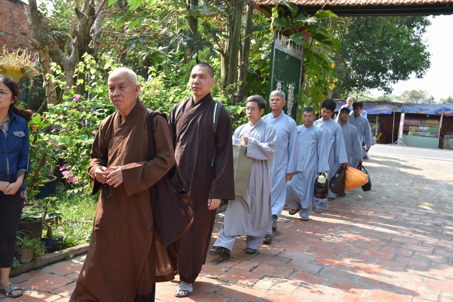 The rite of offering a meal and alms for monks and releasing creatures.
