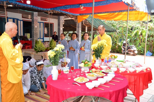 The rite of offering a meal and alms for monks and releasing creatures.