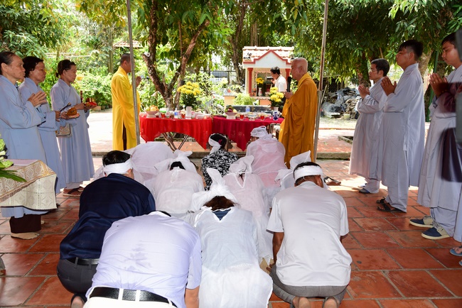 The rite of offering a meal and alms for monks and releasing creatures.