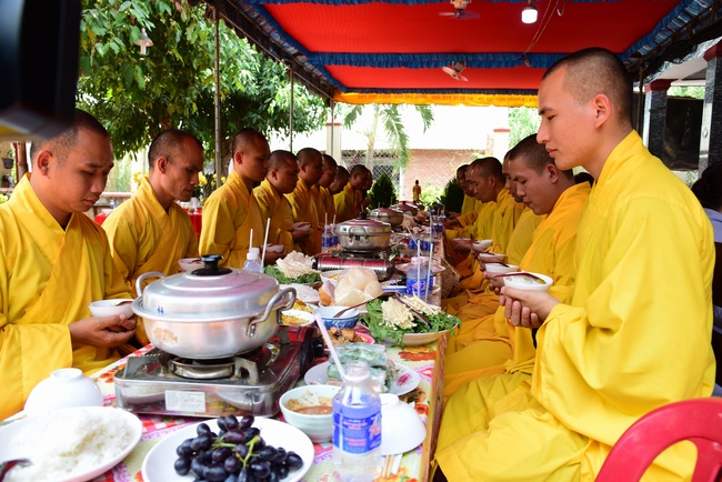 The rite of offering a meal and alms for monks and releasing creatures.