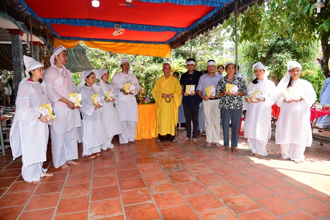 The rite of offering a meal and alms for monks and releasing creatures.