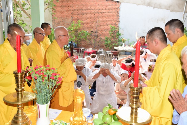 The rite of offering a meal and alms for monks and releasing creatures.