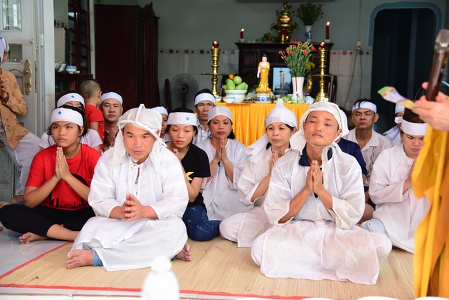 The rite of offering a meal and alms for monks and releasing creatures.