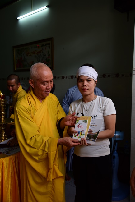 The rite of offering a meal and alms for monks and releasing creatures.