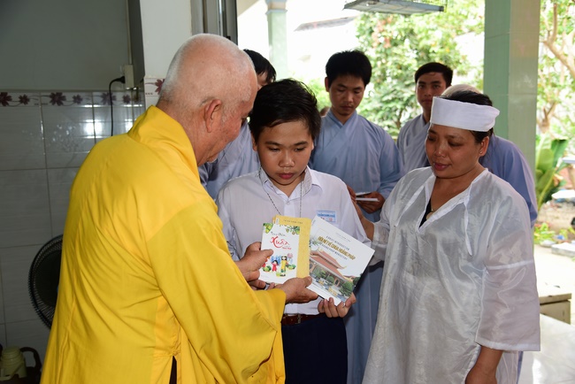 The rite of offering a meal and alms for monks and releasing creatures.