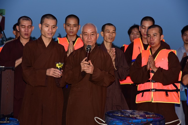The rite of offering a meal and alms for monks and releasing creatures.