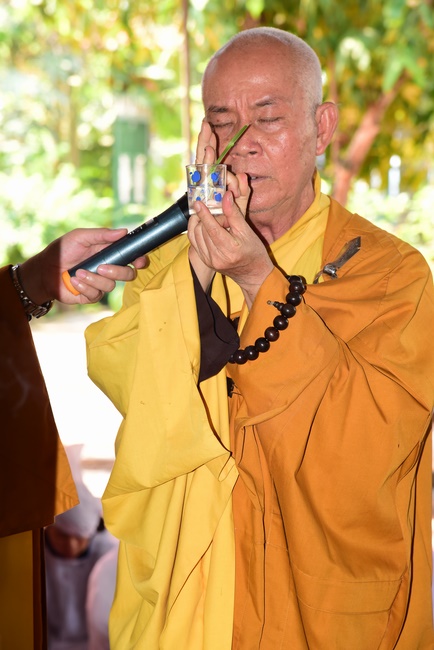 The rite of offering a meal and alms for monks and releasing creatures.