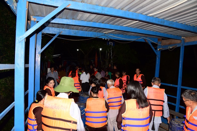 The rite of offering a meal and alms for monks and releasing creatures.