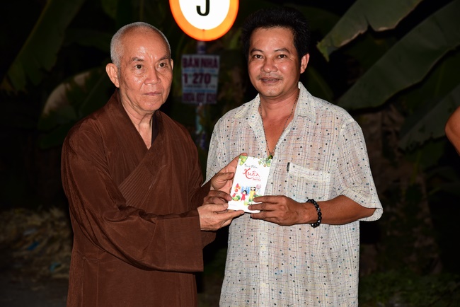 The rite of offering a meal and alms for monks and releasing creatures.