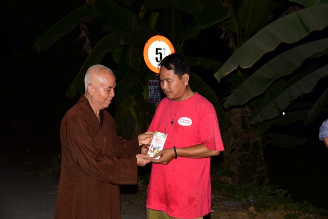 The rite of offering a meal and alms for monks and releasing creatures.