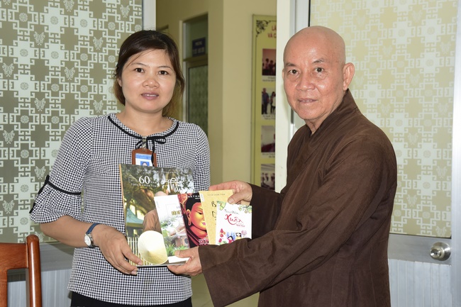 Giving gifts at Thanh Loc Polio Pupporting and Nurturing Center