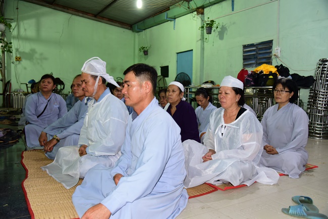 Praying for the rebirth in Hoc Mon