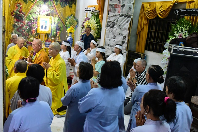 Praying for rebirth in District 11 and Hoc Mon