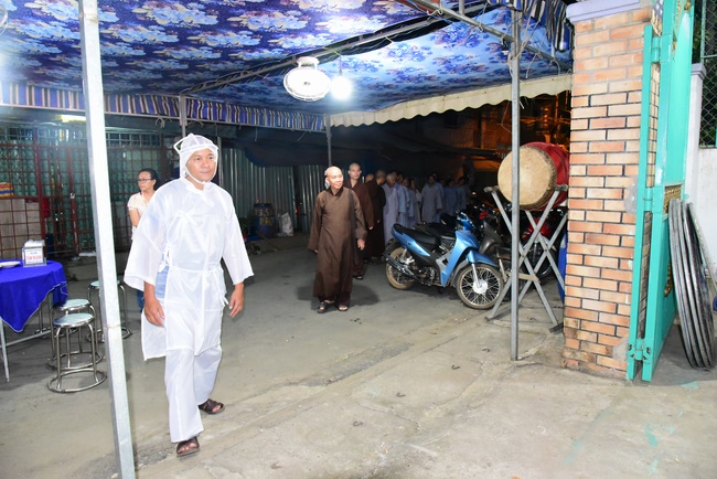 Praying for rebirth in District 11 and Hoc Mon