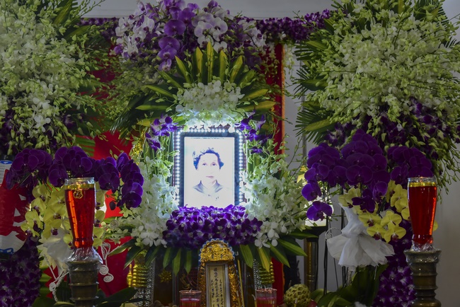 Praying for rebirth in District 11 and Hoc Mon