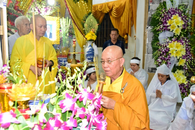 Praying for rebirth in District 11 and Hoc Mon