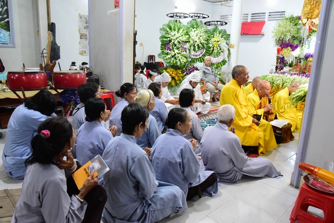 Praying for rebirth in District 11 and Hoc Mon