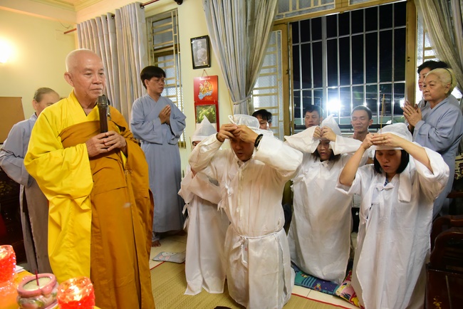 Praying for rebirth in District 11 and Hoc Mon