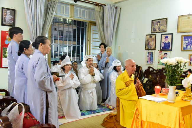 Praying for rebirth in District 11 and Hoc Mon