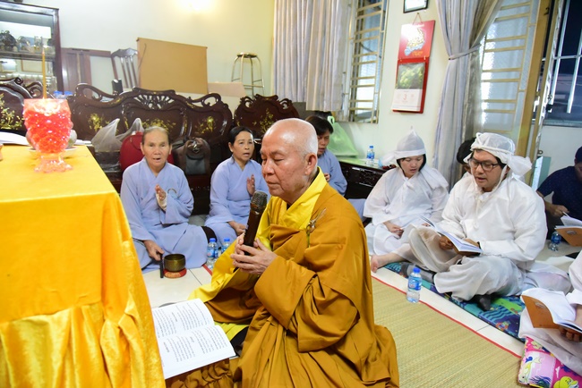 Praying for rebirth in District 11 and Hoc Mon