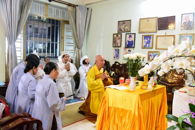 Praying for rebirth in District 11 and Hoc Mon