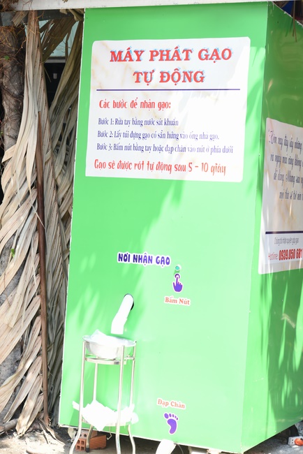 The handover ceremony of saline water purifier and rice ATM machine at Quoc Thoi Pagoda in Ben Tre